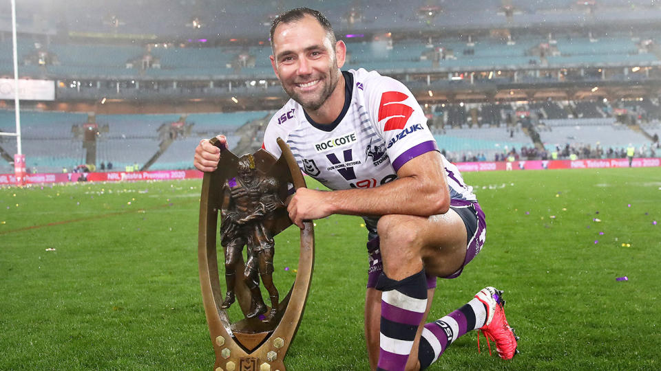 Cameron Smith is seen here posing with the 2020 NRL premiership trophy.