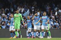 Napoli's players leave the field after the Serie A soccer match between Napoli and Salernitana, at the Diego Armando Maradona stadium in Naples, Italy, Sunday, April 30, 2023. The match ended in a 1-1 draw. (Alessandro Garofalo/LaPresse via AP)