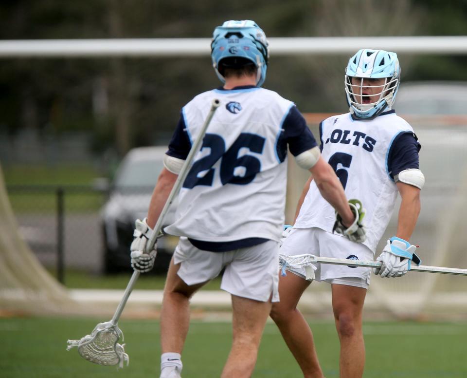 CBA's Luke Crebs celebrates his goal against Wall at home Wednesday, April 10, 2024, with teammale Quinn Kelly (#26).