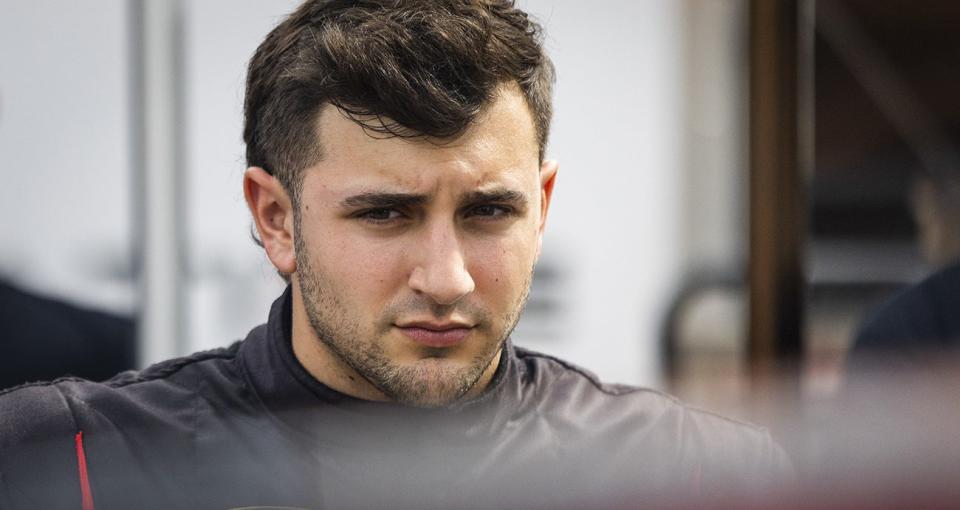 Justin Brown, driver of the #46 Riverhead Building Supply, looks on before the New Smyrna Beach Visitors Bureau 200 for the NASCAR Whelen Modified Tour during night 2 of the World Series of Asphalt Stock Car Racing at New Smyrna Speedway in New Smyrna, Florida on February 11, 2023. (Adam Glanzman/NASCAR)