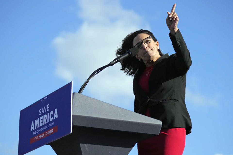 Former South Carolina state lawmaker Katie Arrington speaks at a rally ahead of an appearance by former President Donald Trump on Saturday, March 12, 2022, in Florence, S.C. Arrington — now making a second congressional bid — says a dispute over her access to top-secret government information has been part of a politically motivated smear campaign tied to her support of former President Donald Trump. (AP Photo/Meg Kinnard)