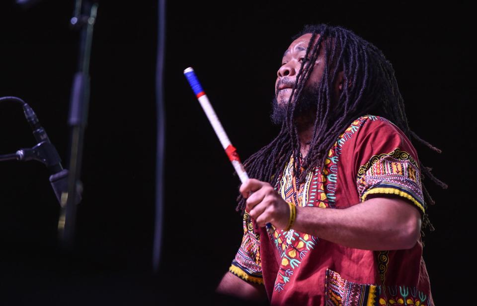 Shawn Lawrence, one half of the Alkebulan Music Philosophy group, performs during Visit Jackson's 2nd annual 'Capital City Lights' event in downtown Jackson, Miss., Friday, December 2, 2022.