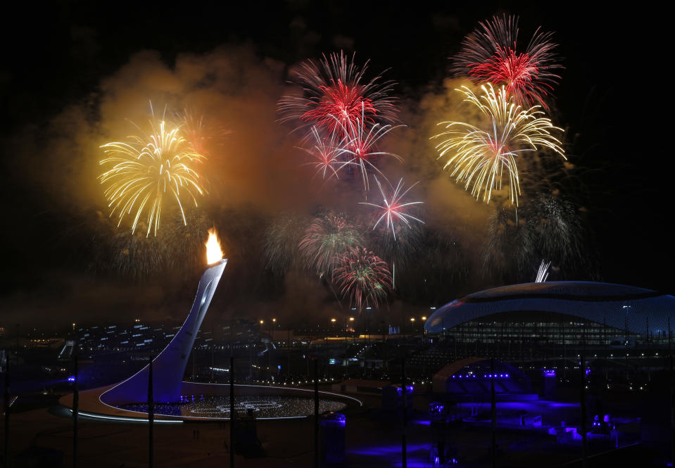 Fireworks are seen over the Olympic Cauldron during the opening ceremony of the 2014 Winter Olympics in Sochi, Russia, Friday, Feb. 7, 2014. (AP Photo/Julio Cortez)