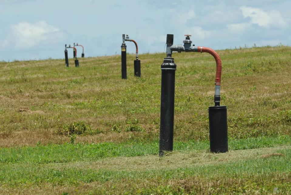 Gas wells that capture methane gas dot the hillside of the Manatee County Landfill on Lena Road in 2013.