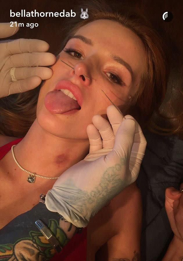 Watch The Cringe Worthy Moment Bella Thorne Gets A Septum Piercing