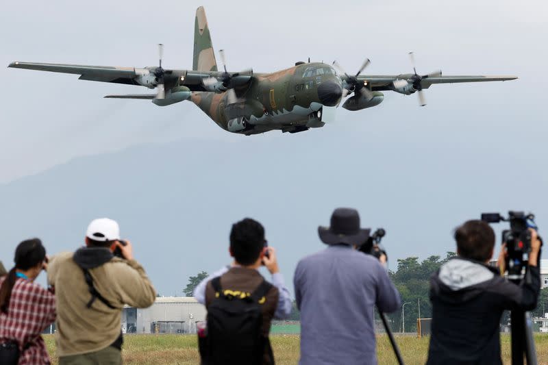 A Taiwan Air Force C-130 aircraft flies past during a demonstration for the media at the Pingtung air base in Pingtung