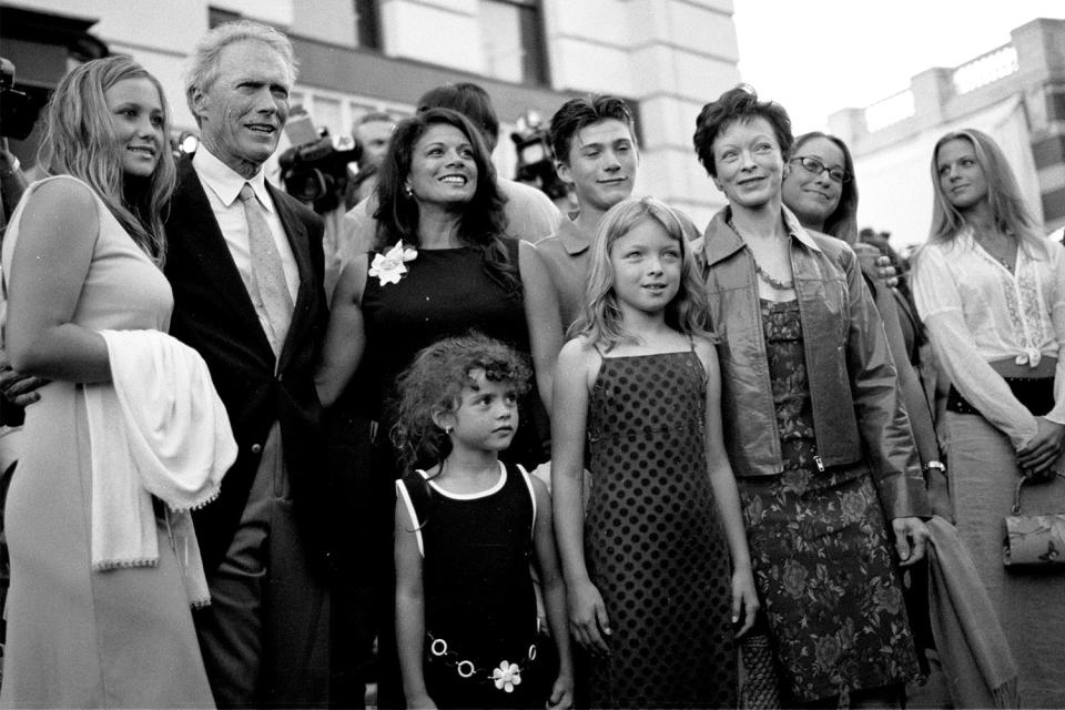 <p>Ruiz, Fisher and several of Eastwood's children joined him in 2002 for the premiere of <em>Blood Work. </em></p>