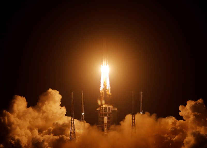 The Long March-5 Y5 rocket, carrying the Chang'e-5 lunar probe, takes off from Wenchang Space Launch Center, in Wenchang