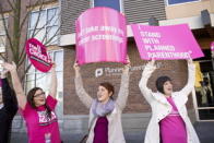 <div class="caption-credit"> Photo by: AP</div><div class="caption-title">The Susan G. Komen/Planned Parenthood showdown</div>In February, the Susan G. Komen Foundation <a href="http://shine.yahoo.com/healthy-living/komen-foundation-cuts-funds-planned-parenthood-155700953.html" data-ylk="slk:ended its grants to Planned Parenthood;elm:context_link;itc:0;sec:content-canvas;outcm:mb_qualified_link;_E:mb_qualified_link;ct:story;" class="link  yahoo-link">ended its grants to Planned Parenthood</a> -- and then quickly <a href="http://shine.yahoo.com/healthy-living/inside-susan-g-komen-foundations-decision-reverse-planned-183600623.html" data-ylk="slk:reversed their decision;elm:context_link;itc:0;sec:content-canvas;outcm:mb_qualified_link;_E:mb_qualified_link;ct:story;" class="link  yahoo-link">reversed their decision</a> when the social media backlash started. The reversal didn't do them many favors: People who <a href="http://shine.yahoo.com/healthy-living/former-susan-g-komen-vp-karen-handel-planned-180200826.html" data-ylk="slk:supported the funding cut;elm:context_link;itc:0;sec:content-canvas;outcm:mb_qualified_link;_E:mb_qualified_link;ct:story;" class="link  yahoo-link">supported the funding cut</a> were furious that the breast cancer charity seemed to be backing down. Shine readers were on both sides of the issue. <br> <br> "The issue is CANCER, not abortion. How many women without health care will not receive life saving breast cancer screenings because of Komen's decision?" asked "Becky." "It's a sad day when a breast cancer foundation turns their back on women because of political issues." < b