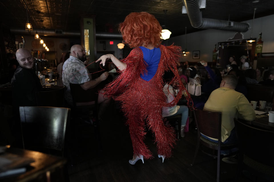 Drag queen Harpy Daniels, aka Joshua Kelley, performs during the "Mimosas & Heels Drag Brunch" at the Public House, Sunday, March 5, 2023, in Norfolk, Va. The drag brunch was hosted by Harpy Daniels and Javon Love. (AP Photo/Carolyn Kaster)