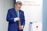 Display ceremony for the Olympic Flame at the Olympic Museum in Tokyo