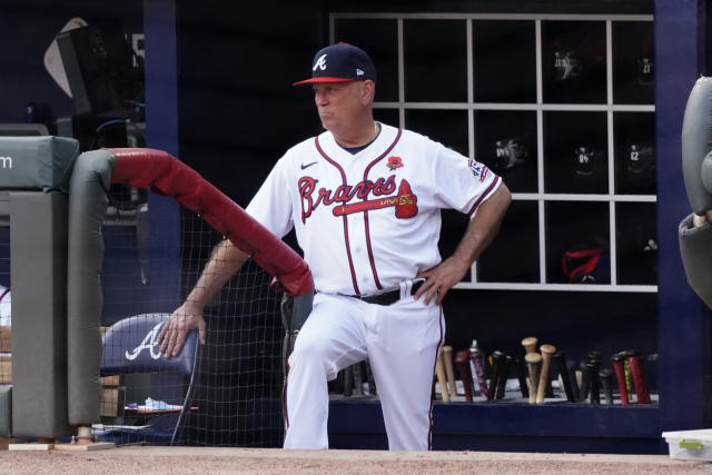 Atlanta Braves manager Brian Snitker watches from the dugout