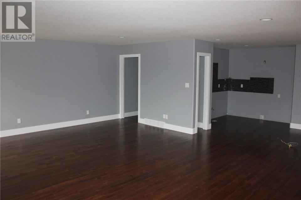 <p><span>138 Johns Rd., Saskatoon, Sask.</span><br> The home has a legal suite with a separate entrance.<br> (Photo: Zoocasa) </p>
