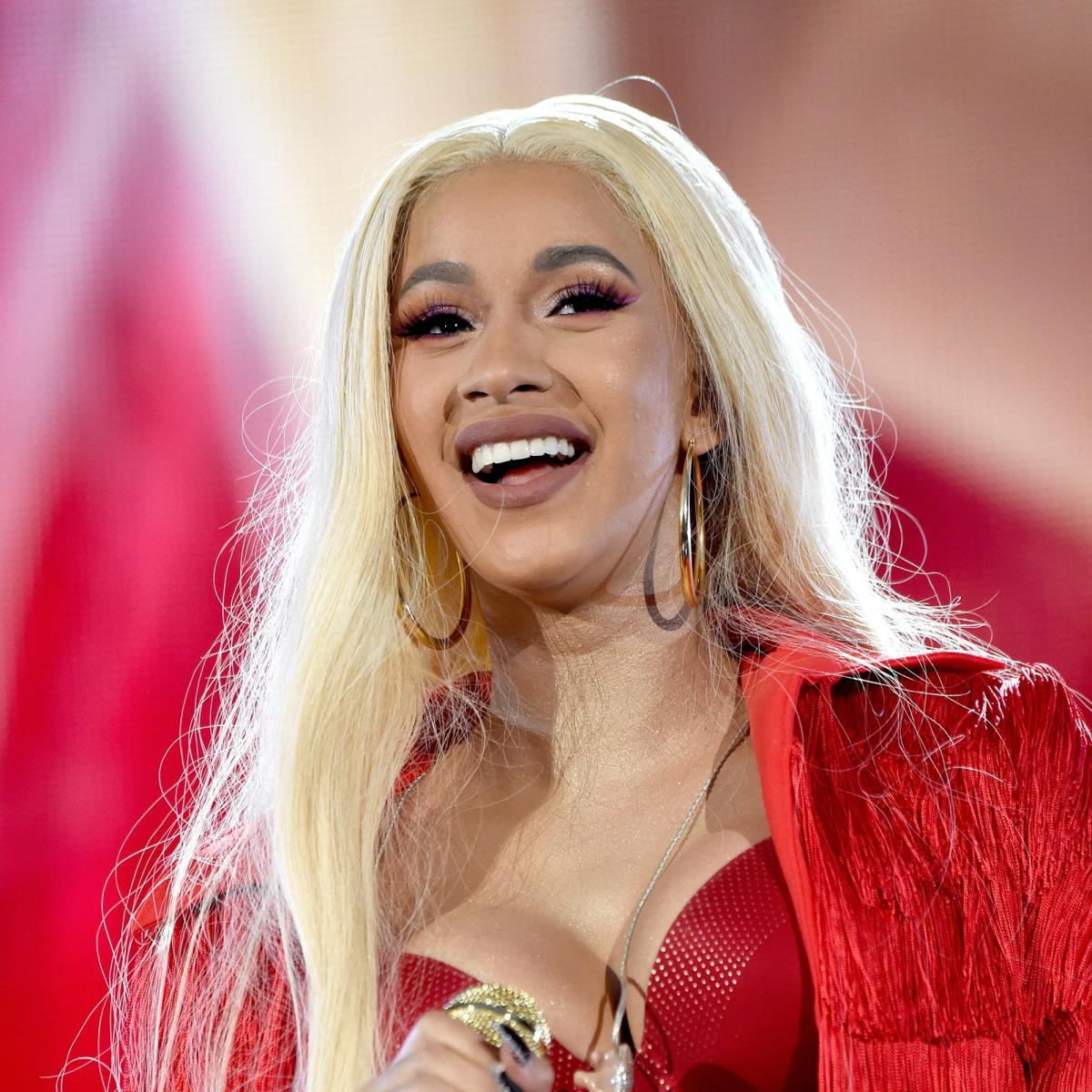 Cardi B Enters NYC Office Wearing Beautiful Baby Blue Suit