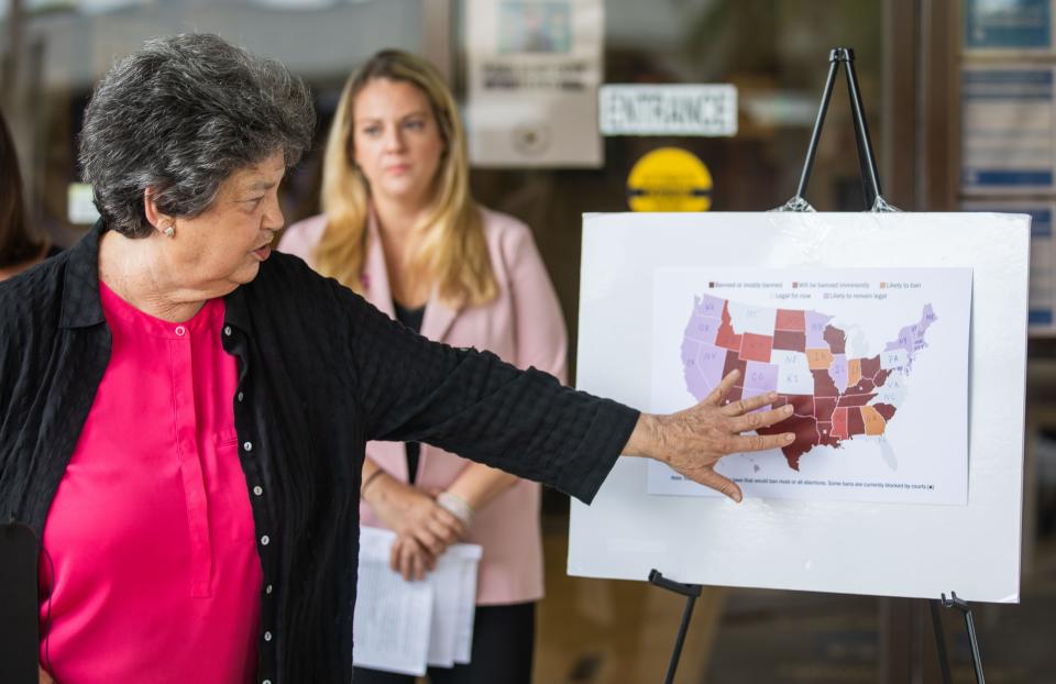 U.S. Rep. Lois Frankel shows a map depicting the varying levels of access to abortion services across the country during a press conference in July in downtown West Palm Beach.