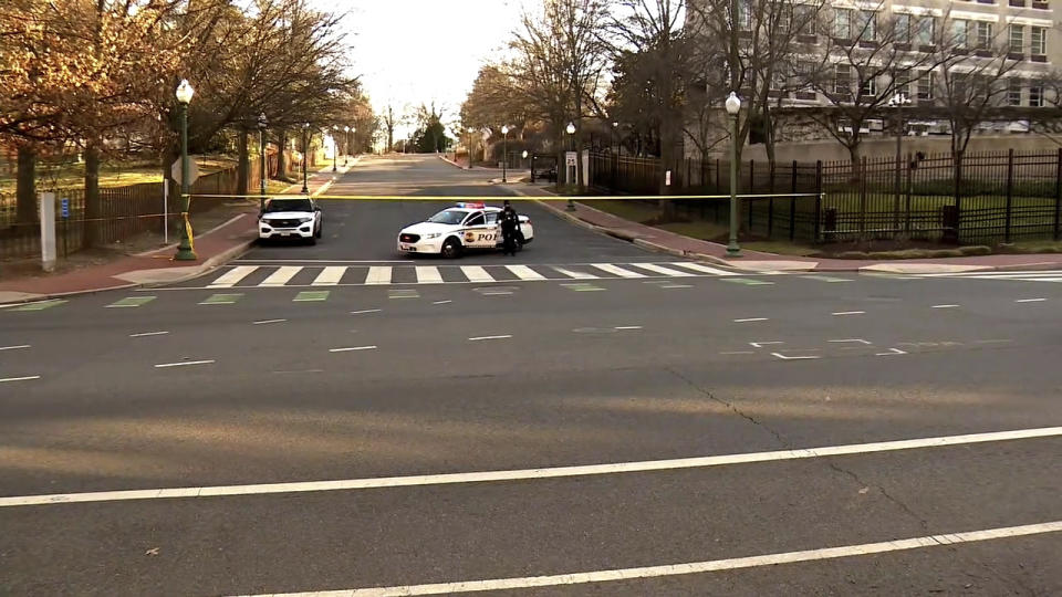 FILE - In this image taken from video, police are deployed outside the Israeli Embassy in Washington, Sunday, Feb. 25, 2024, after an active-duty member of the U.S. Air Force was critically injured after setting himself ablaze outside the diplomatic compound. On Friday, March 1, 2024, The Associated Press reported on stories circulating online incorrectly claiming Israel’s Mossad intelligence agency called the U.S. Air Force an “enemy” of Israel in a post on X after an active-duty member of the military branch set himself on fire outside the Israeli Embassy in Washington. (WJLA via AP, File)