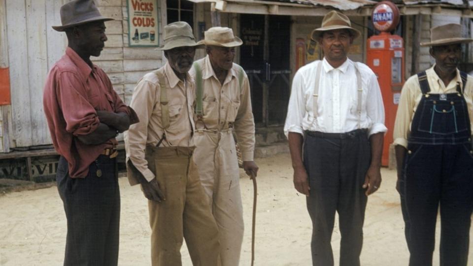 Men included in a syphilis study pose for a photo in Tuskegee, Ala., in this 1950’s file photo released by the National Archives. Most Black Americans said in a survey that they experience racial discrimination regularly and that such experiences inform how they view major U.S. institutions, according to a new study from the Pew Research Center released June 10, 2024. The study seeks to highlight the country’s documented racist history against Black people as a possible explanation for why Black Americans believe major U.S. institutions are holding them back.