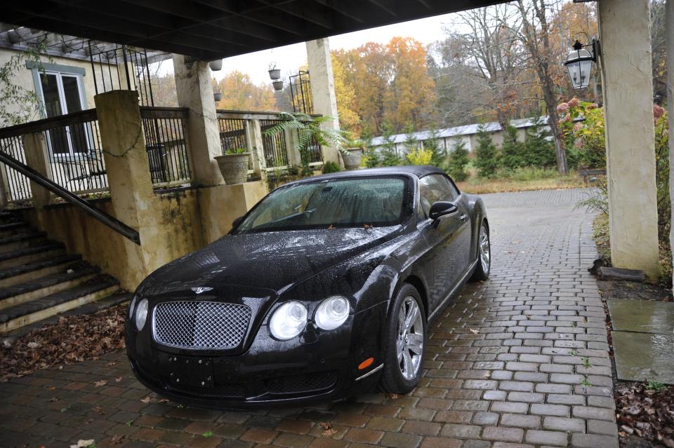 Shown is a Bentley Continental GTC seized by federal authorities in a coronavirus loan fraud case involving a New York man who stole more than $4 million and purchased, in part, luxury cars and a New Jersey bed and breakfast styled like a European castle.