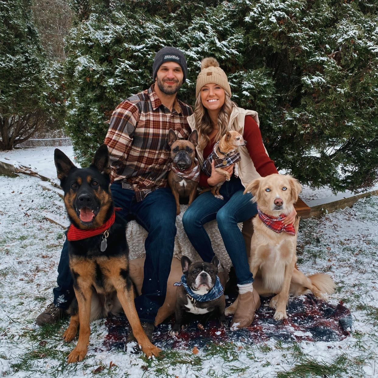 Family portrait: Chelsea Williamson with her fiance Steve Hale and their five rescue dogs (clockwise from the left: Rocky, Leo, Tristan, Yeti and Indy).