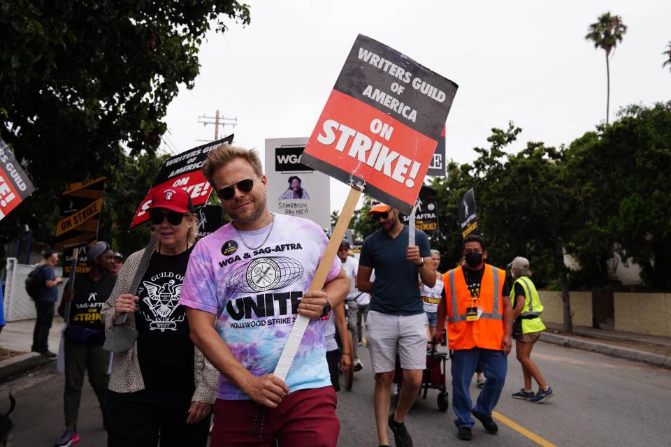 adam conover picketing with wga