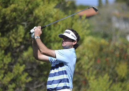 Feb 16, 2014; Pacific Palisades, CA, USA; Bubba Watson (USA) hits on the fourth hole during the fourth round of the Northern Trust Open at Riviera Country Club. Andrew Fielding-USA TODAY Sports