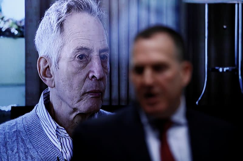 A photo of Robert Durst is shown as Deputy District Attorney John Lewin makes opening statements in the Robert Durst's murder trial in Los Angeles