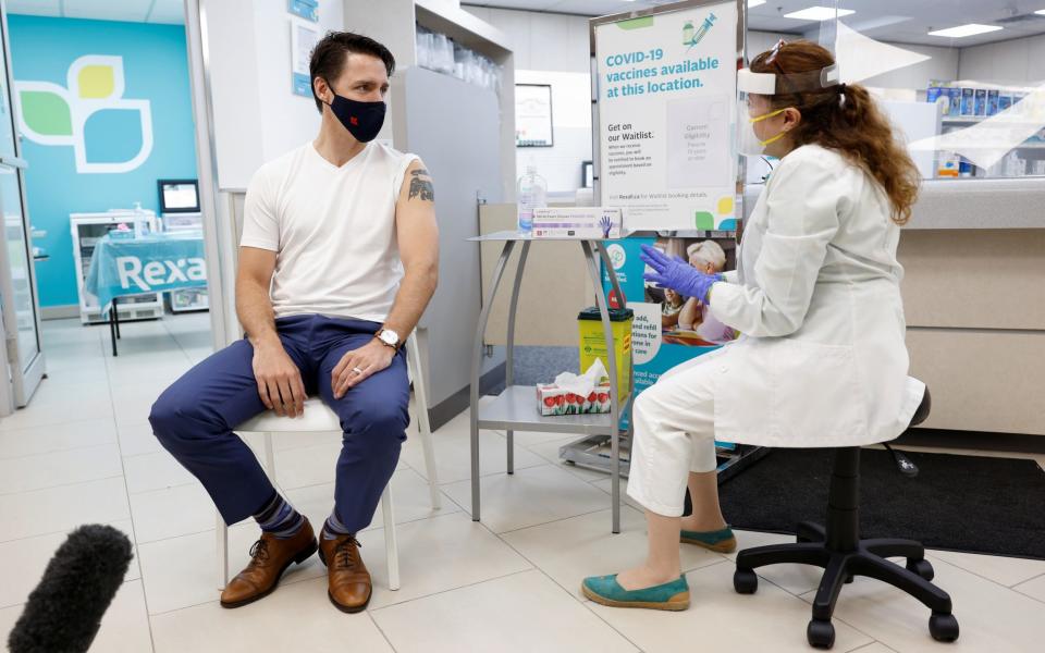 Canada's Prime Minister Justin Trudeau receives his second Covid-19 vaccine dose in Ottawa on 2 July 2021 - Blair Gable/Reuters