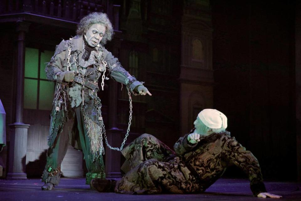 Walter Coppage, left, has played Marley’s Ghost and three other characters in Kansas City Repertory Theatre’s productions of “A Christmas Carol.” Gary Neal Johnson is the perennial Scrooge.