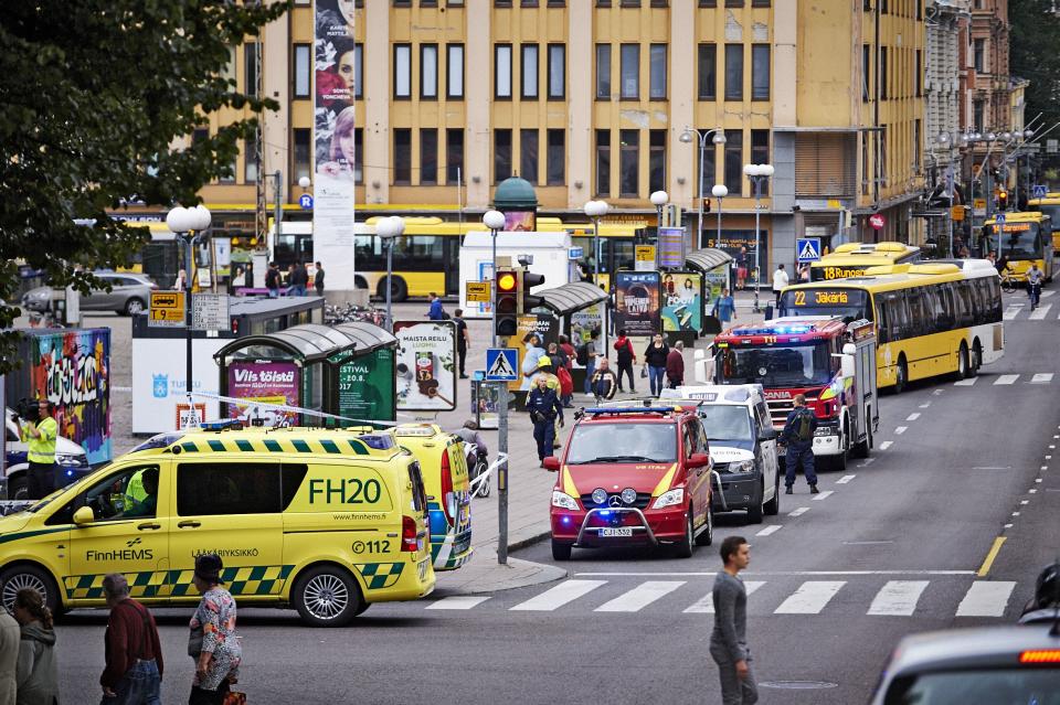 <p>Ambulance cars gather at the site of a multiple stabbing on the Market Square in Turku, Finland, Aug. 18, 2017. (Ari Matti Ruuska/Turun Sanom/REX/Shutterstock) </p>