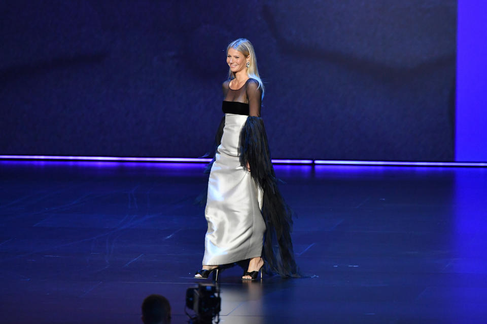 Paltrow walks across the stage as Stevie Wonder's&nbsp;&ldquo;Superstition&rdquo; blares in the background. (Photo: Amy Sussman via Getty Images)
