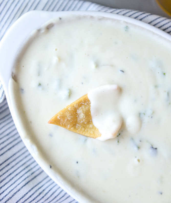 <strong>Get the <a href="https://www.howsweeteats.com/2015/09/roasted-green-chile-queso-cheese-dip/" target="_blank">Roasted Green Chile Queso Cheese Dip</a> recipe from How Sweet Eats</strong> (this recipe keeps warm in the slow cooker during the party)