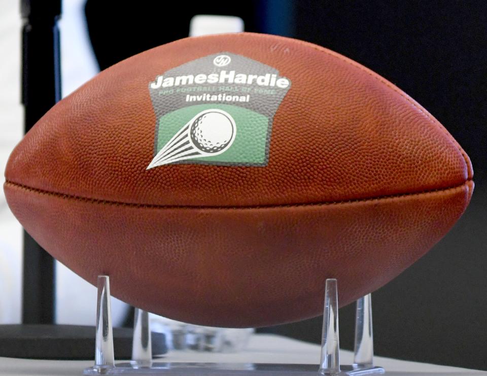 A football shows the logo of the new James Hardie Pro Football Hall of Fame Invitational during an official announcement at the Hall of Fame, Jan. 23, 2024, about the new event, which debuts March 31-April 6, 2025, in Boca Raton, Florida.