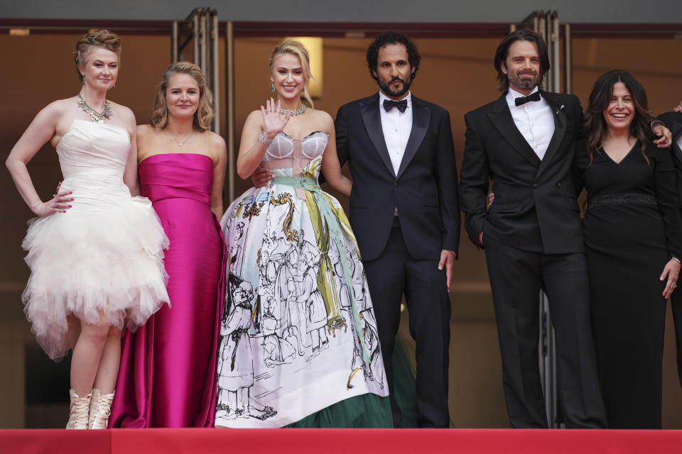 Julianne Forde, from left, Ruth Treacy, Maria Bakalova, director Ali Abbasi, Sebastian Stan, and Amy Baer pose for photographers upon arrival at the premiere of the film 'The Apprentice' at the 77th international film festival, Cannes, southern France, Monday, May 20, 2024. (Photo by Scott A Garfitt/Invision/AP)