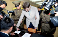 <p>U.S. student Otto Warmbier has his fingerprints taken at North Korea’s top court in Pyongyang on March 16, 2016. North Korea’s supreme court sentenced Warmbier, a 21-year-old University of Virginia student, who was arrested while visiting the country, to 15 years of hard labor on for crimes against the state. (Photo: KCNA/Reuters) </p>