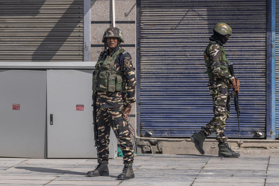 Indian paramilitary soldiers stand guard on the Independence Day in Srinagar, Indian controlled Kashmir, Tuesday, Aug. 15, 2023. Security has been beefed up in the region around the venues of India's Independence Day celebrations. (AP Photo/Dar Yasin)