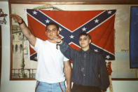 <p>This undated photo provided by Christian Picciolini shows him at left with Shannon Martinez giving Nazi salutes while both were affiliated with racist skinhead organizations as young people decades ago. Picciolini went on to begin Life After Hate, a nonprofit that works to get people out of extremist groups, and Martinez volunteers by talking to people in an online forum sponsored by the organization. (Photo: Alex Picciolini/Courtesy of Christian Picciolini via AP </p>