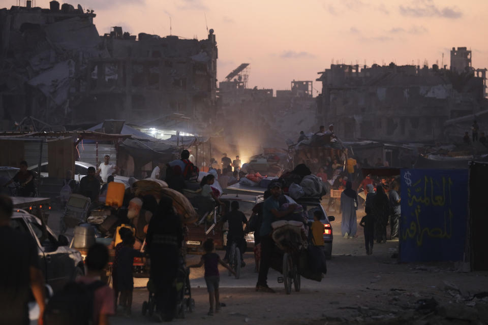 Palestinians displaced by the Israeli air and ground offensive on the Gaza Strip flee from parts of Khan Younis following an evacuation order by the Israeli army to leave the eastern part of Gaza Strip's second largest city on Monday, July 1, 2024. (AP Photo/Saher Alghorra)