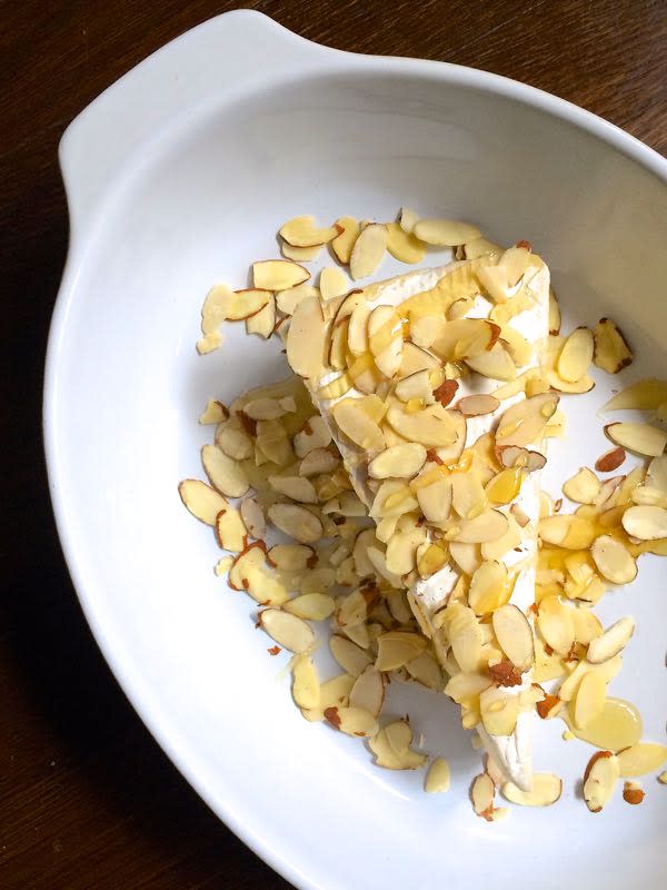 <p>The Lemon Bowl</p><p>A simple stunner that takes three ingredients in a few minutes.</p><p><strong>Get the recipe: <a href="http://thelemonbowl.com/2014/11/baked-brie-with-honey-and-sliced-almonds.html" rel="nofollow noopener" target="_blank" data-ylk="slk:Baked Brie with Honey and Sliced Almonds;elm:context_link;itc:0;sec:content-canvas" class="link ">Baked Brie with Honey and Sliced Almonds</a></strong></p>