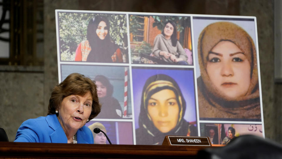 U.S. Senator Jeanne Shaheen (D-NH), talks about women in Afghanistan, including the seven pictured women who were killed in Afghanistan, as she questions Zalmay Khalilzad, special envoy for Afghanistan Reconciliation, during a Senate Foreign Relations Committee hearing on Capitol Hill in Washington, U.S., April 27, 2021. (Susan Walsh/Pool via Reuters)