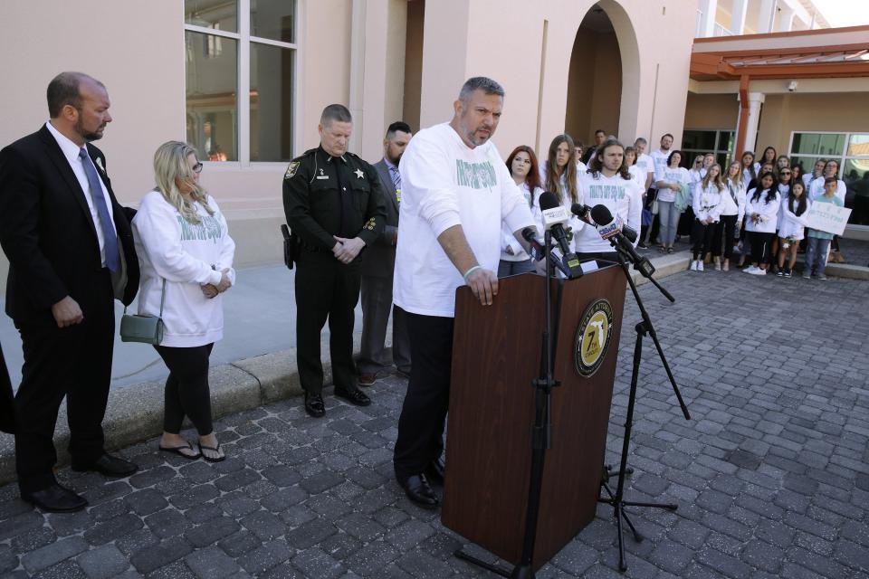 Surrounded by family and supporters, Forrest Bailey, the father of Tristyn Bailey, addresses the media and the community outside the St. Johns County Courthouse after Aiden Fucci was sentenced to life in prison on Friday. In February, Fucci pleaded guilty to the first-degree murder of 13-year-old Tristyn.