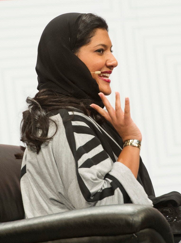 Saudi Arabian Princess Reema Bint Bandar Al-Saud waves to the large crowd as she is introduced during her keynote address at the Austin Convention Center on Saturday, March 14, 2015.