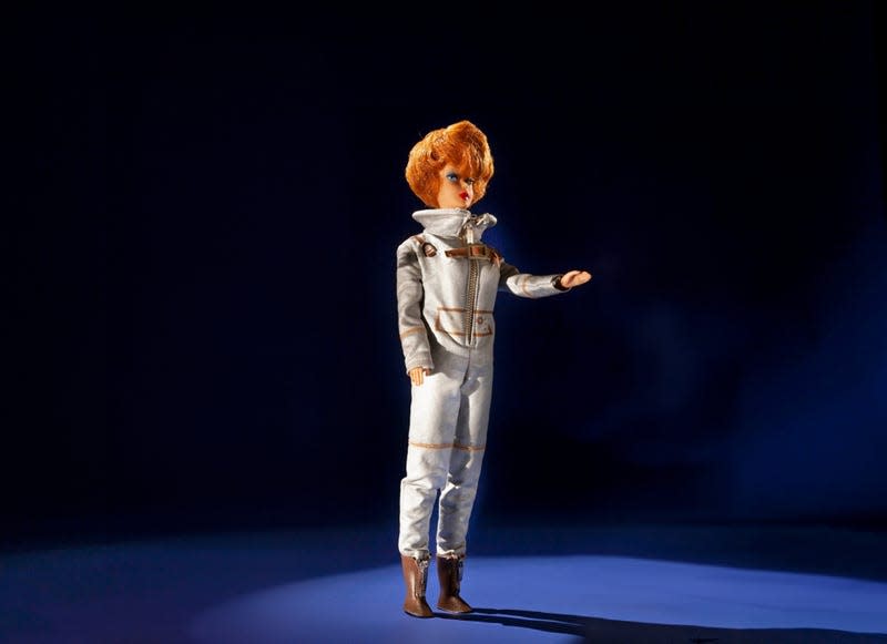 A Barbie doll dressed in the Miss Astronaut outfit.