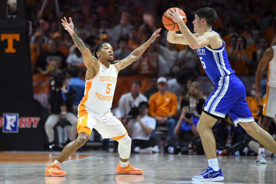 Tennessee guard Zakai Zeigler defends Kentucky guard Reed Sheppard. Sheppard scored 27 points in the Wildcats' road victory Saturday.
