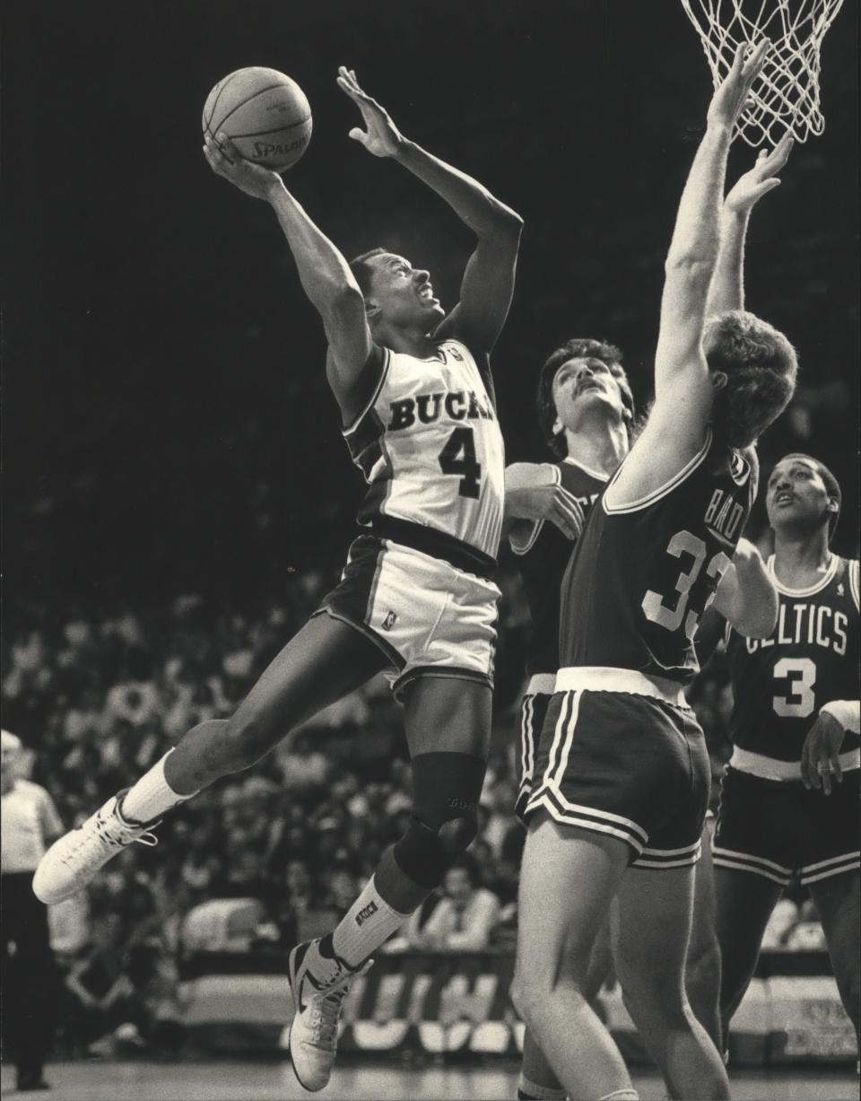 Sidney Moncrief of the Milwaukee Bucks went up for two of his game-high 34 points on May 15, 1987, at the Arena as the Boston Celtics' Larry Bird (33), Dennis Johnson (3) and Greg Kite defended.  The Milwaukee Bucks won Game 6 of the Eastern Conference semifinals, 121-111.