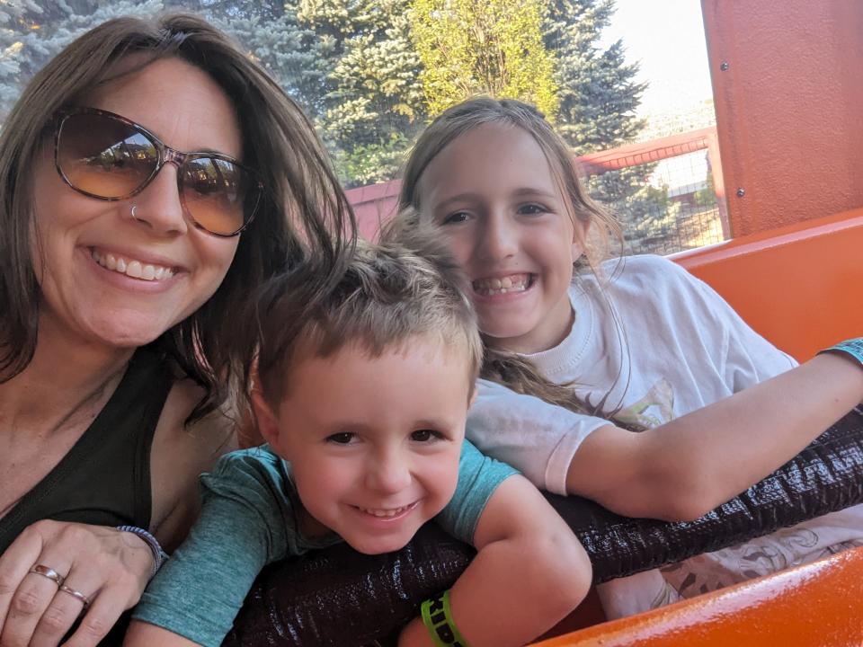 Amy Breitner with her two youngest children, 4-year-old Harrison (center), and 9-year-old Isabella (right).
