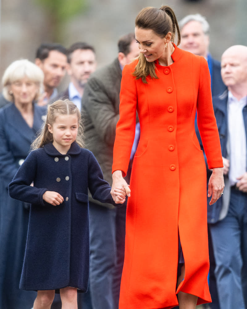 Princess Catherine and Princess Charlotte walk hand in hand