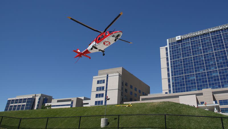 A LifeFlight helicopter is pictured at Intermountain Medical Center in Murray, Wednesday, June 20, 2012. A man was transported by medical helicopter to a hospital with critical injuries he suffered when part of a power line structure fell on him in Spanish Fork Canyon Thursday.