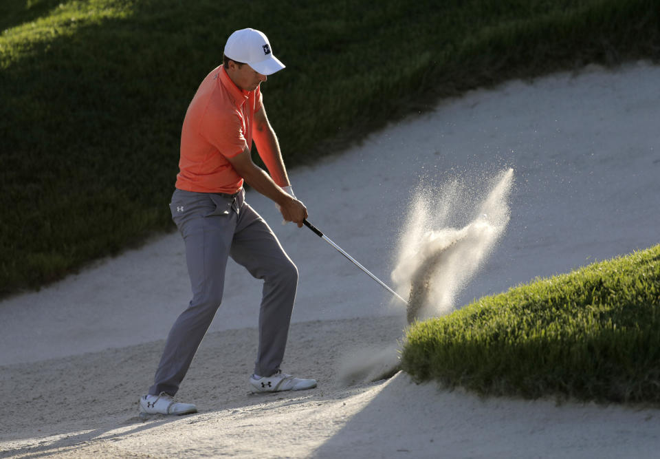 Jordan Spieth hits out of a bunker on the 15th hole during the third round of the PGA Championship golf tournament, Saturday, May 18, 2019, at Bethpage Black in Farmingdale, N.Y. (AP Photo/Julio Cortez)