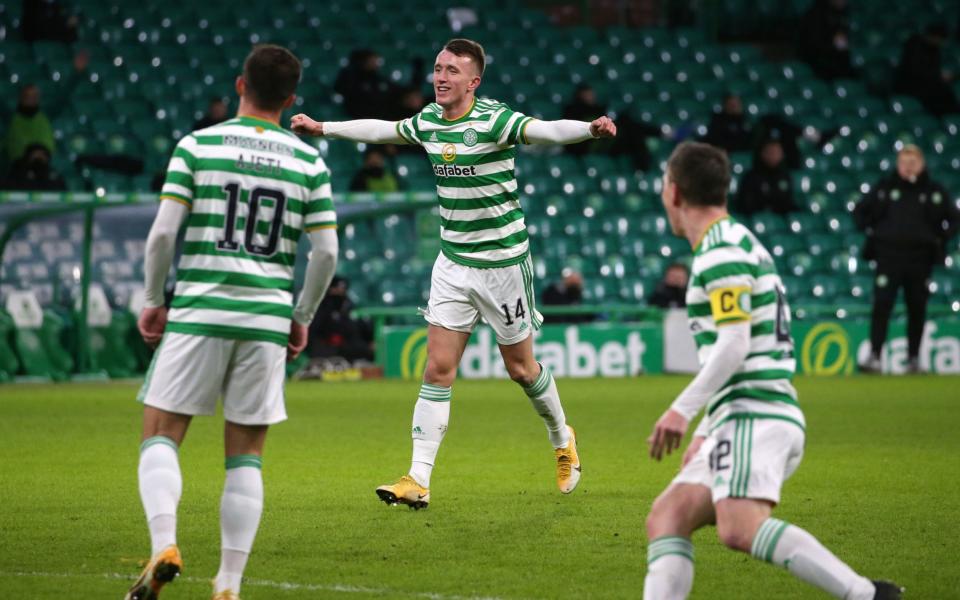 Celtic's David Turnbull (centre) celebrates scoring their side's first goal of the game during the Scottish Premiership match at Celtic Park, Glasgow - PA