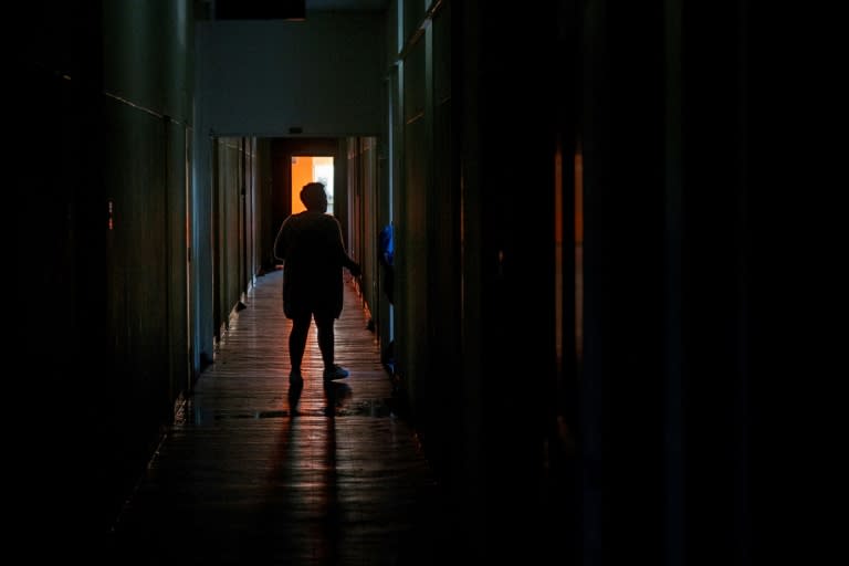 Squatters in a rundown building in central Cape Town have no access to either electricity or water